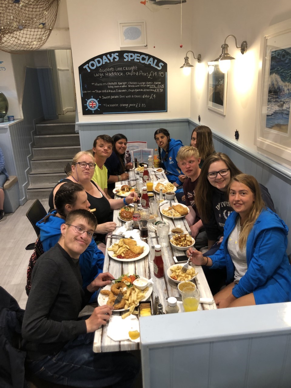 Group of yound people having a meal