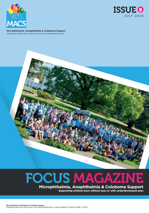 This cover displays a large group photo taken outdoors on a sunny day. The group is sitting and standing on a grassy area next to a path bordered by trees. Many individuals are wearing matching blue T‑shirts, forming a coordinated group. The photo appears tilted intentionally, as if styled like a pinned snapshot. The top banner is light blue with the MACS logo on the left and “ISSUE 9 Summer 2016” on the right. The bottom banner is dark with pink highlights, featuring “FOCUS MAGAZINE” and the MACS support subtitle.