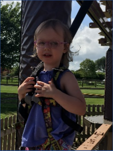 Image shows Emily enjoying an activity